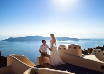 Lovely Couple In Santorini Caldera View