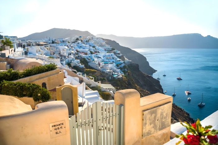 Admiring Caldera View On Santorini