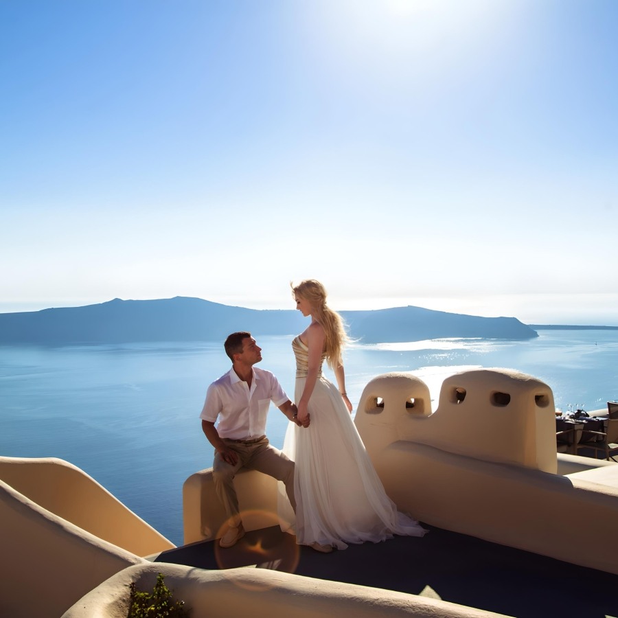 Lovely Couple In Santorini Caldera View